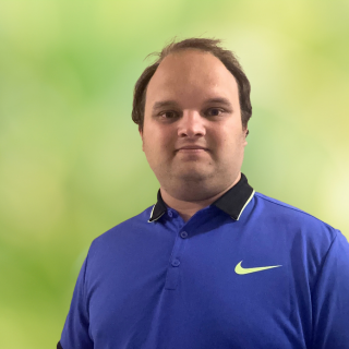 Christopher Burke headshot with green background